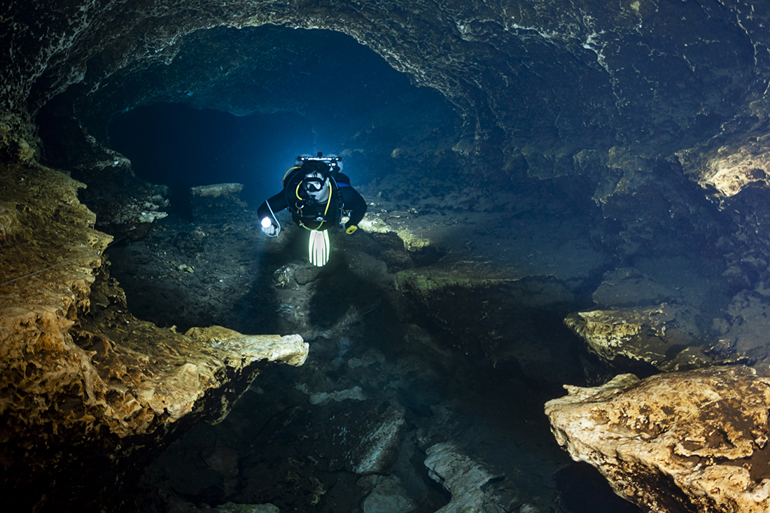 Inside the main passage to Hill 400 of the Devil's Ear cave system.