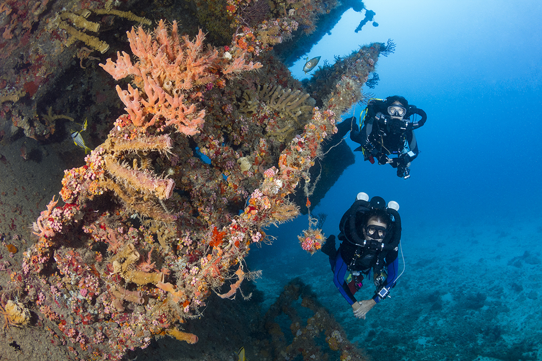 Two rebreather divers exploring the Castor wreck.