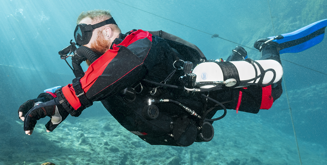 Dive Rite O2PTIMA CM Rebreather mounted to a Dive Rite Nomad Side Mount Harness.