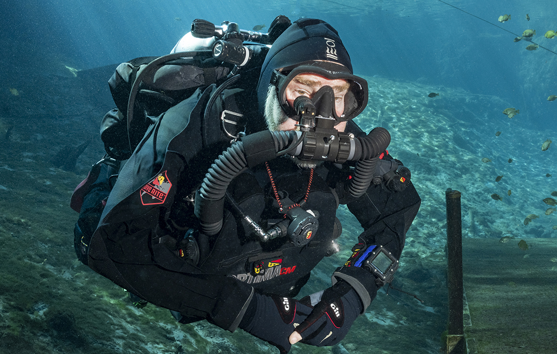 Lamar Hires diving his Optima CM paired with a set of doubles on a TansPac XT harness. Regardless of the make and manufacturer, as long as that scuba harness can accommodate four D-rings (one on top of each shoulder, along with one on each side of the waist) the Optima CM will work with it.