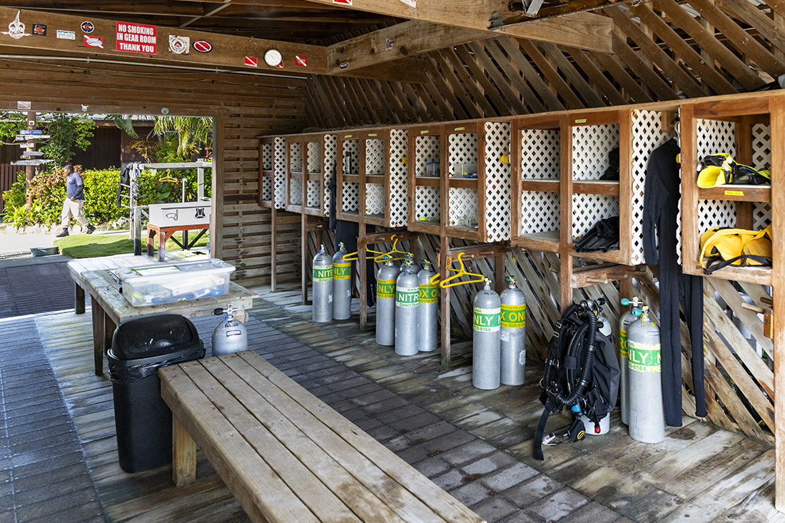 One of Coco View Resort's six "garage-style" gear staging rooms facing their dock where 6 dedicated dive boats await. 