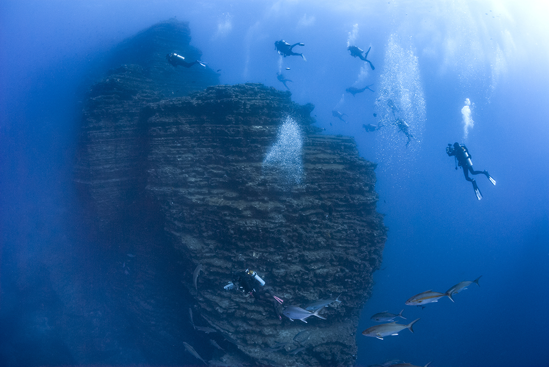 The famed "Boiler" of San Benedicto Island features a huge spire of volcanic rock towering up from a depth of 135 feet to within a few feet from the surface. When ground swells pass over it top, the surface water will have the appearance of boiling, hence the name.